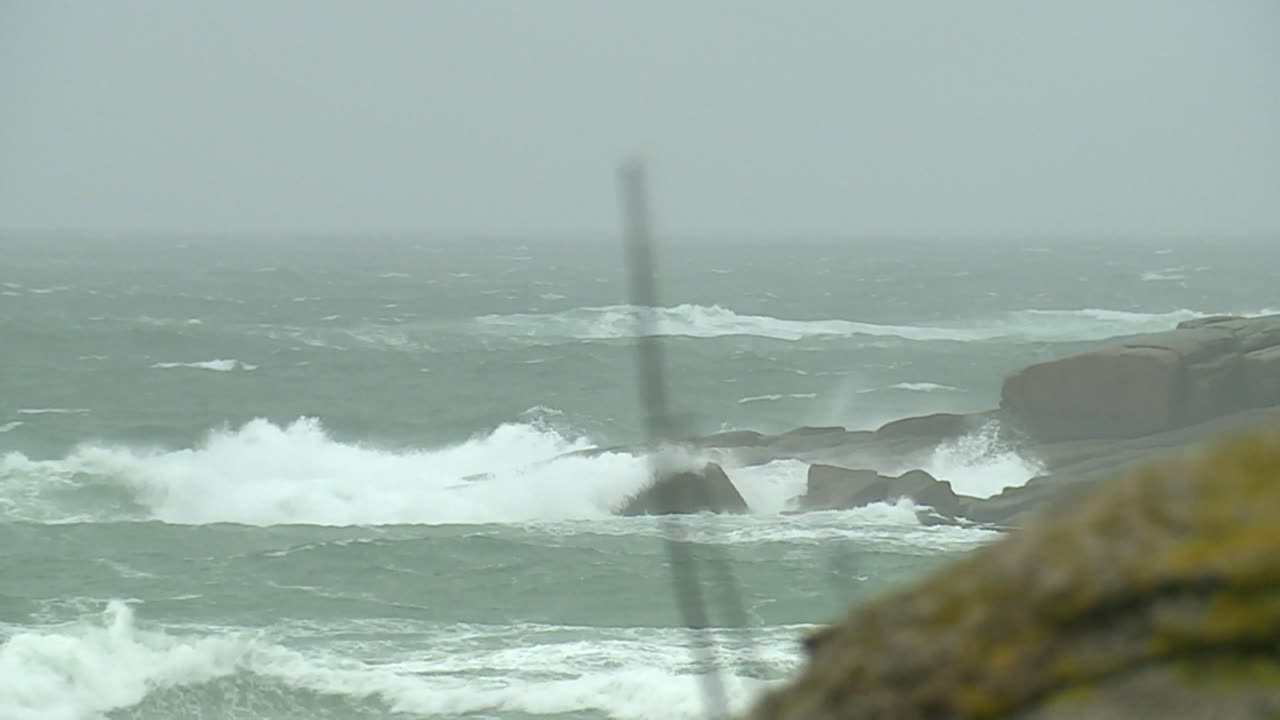 Stormy Ocean Waves Crashing on Rocks