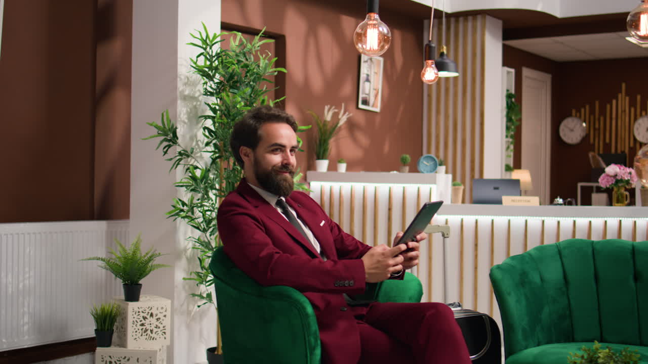 Business associate reads files on tablet