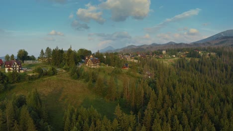 Wooden-Chalet-Houses-In-Scenic-Nature-Surroundings-In-Cyrhla,-Podhale-Region,-Southern-Poland