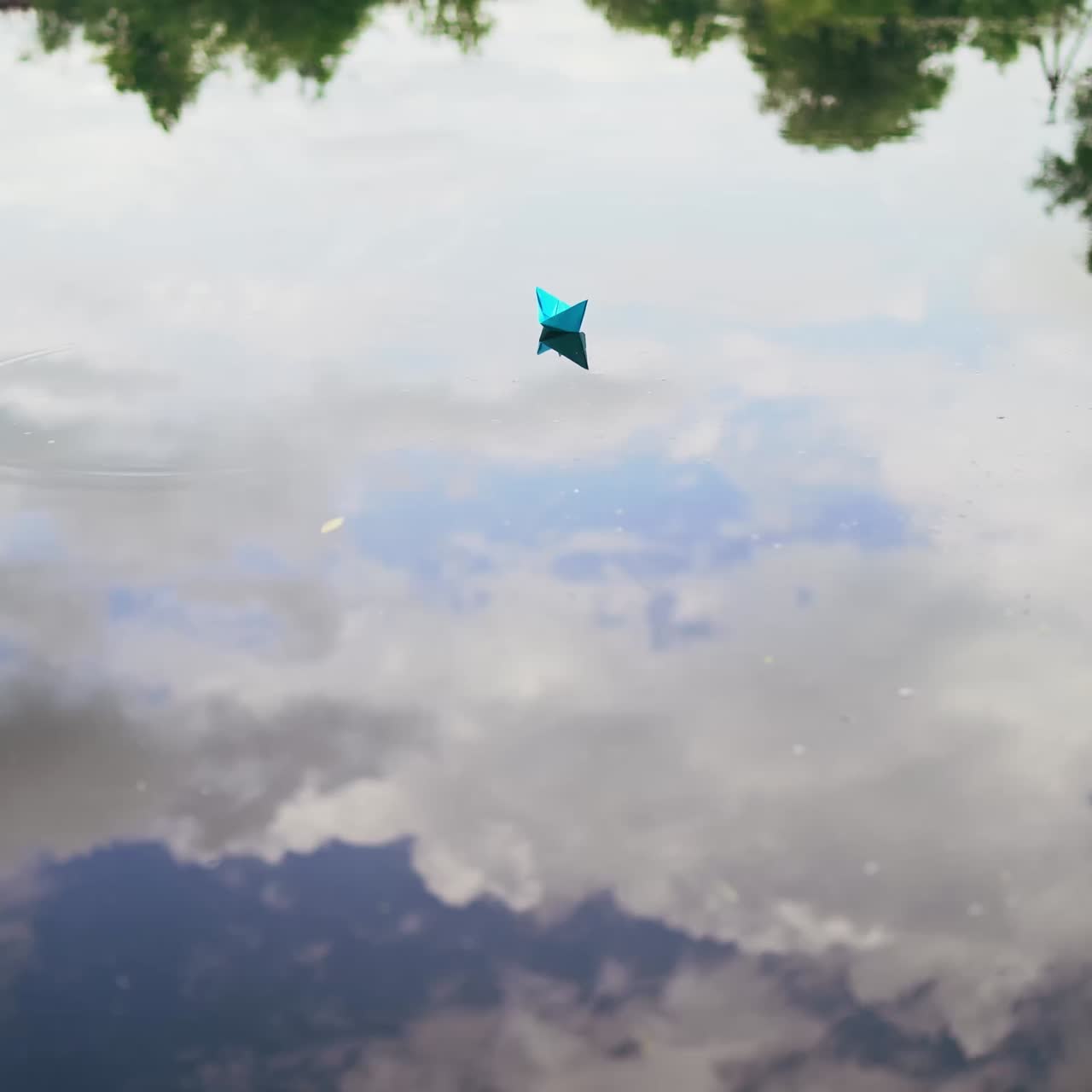 Paper boat on the river