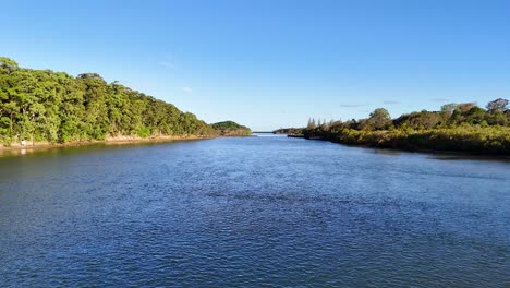 calm river flowing through lush green landscape