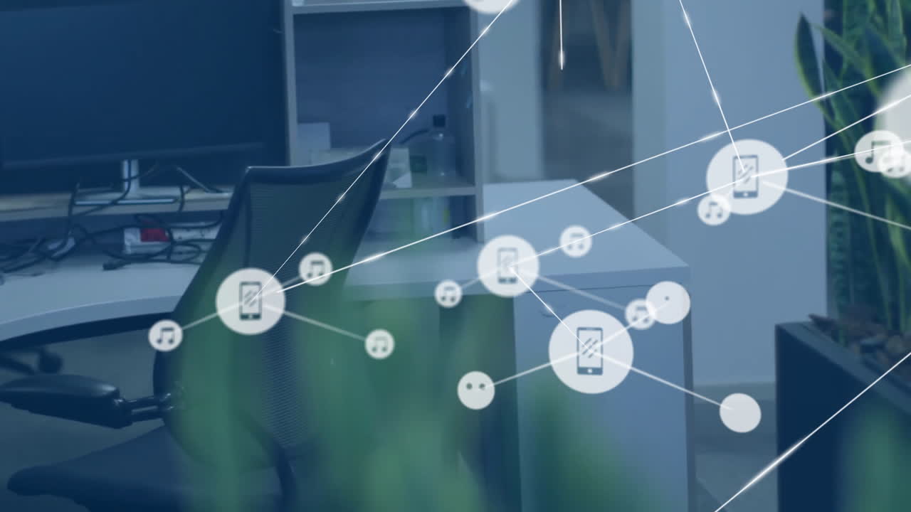 사무실의 책상 위에 아이콘으로 연결된 네트워크의 애니메이션