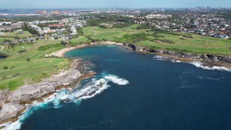 Eastern-Suburbs-And-Beach-Of-Little-Bay-In-Sydney,-New-South-Wales,-Australia---Aerial-Drone-Shot