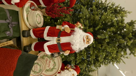 Vertical-shot-of-Santa-Claus-toy-in-shopping-mall-Christmas-decoration