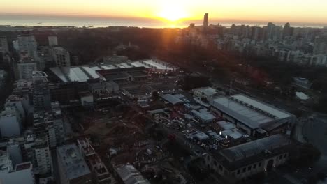 aerial view of city with backgrounds of buildings at sunset