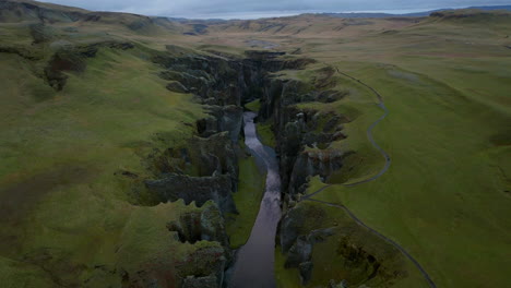 Sunset-View-Of-Fjadra-River-Flowing-Through-Fjadrargljufur-Canyon-In-South-Iceland