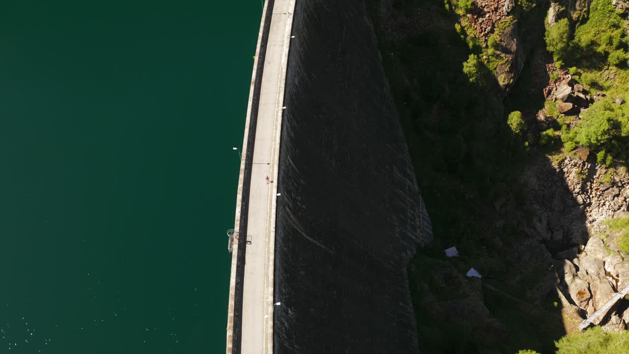 Top down aerial view of Cingino Dam and reservoir in Piedmont, Italy