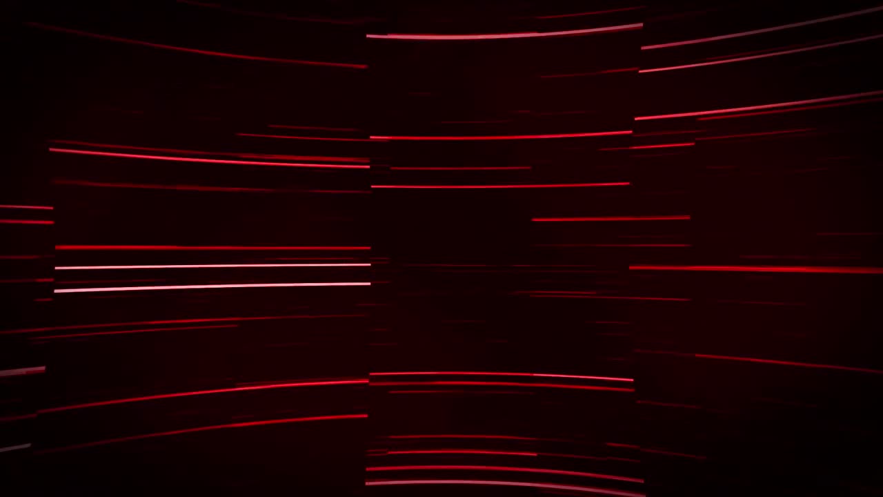 Animation of thin pulsating glowing red lines slowly scrolling over black background