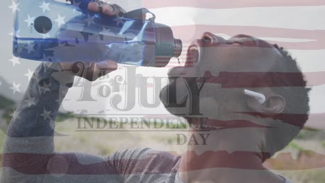 Animation-of-independence-day-text-over-african-american-man-drinking-water-and-hiking