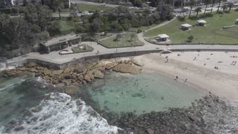 bondi to bronte ocean swim at bronte park with tourist swimmers during summer in eastern suburbs, new south wales, australia