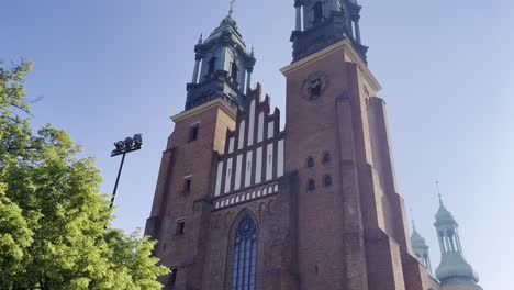 front facade of st peter and st paul's cathedral, the first cathedral in poland - poznan