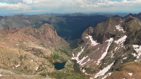scenic mountain landscape with lake and snow