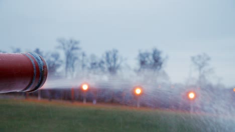 Snow-cannon-makes-artificial-snow-at-night