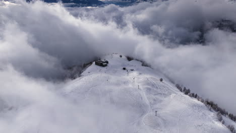 aerial shot in switzerland over the town of crans montana, valais