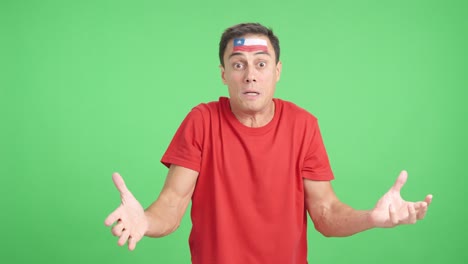 man cheering for chile, angry with the decision of referee