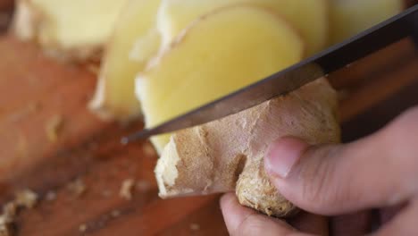 close up of gingers on chopping board