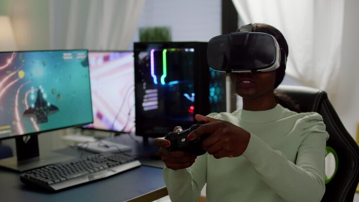 Cyber-giocatore africano concentrato che indossa un visore per la realtà virtuale durante il gioco.