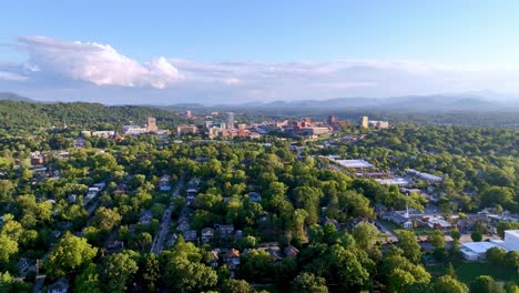 aerial long shot pushing toward asheville nc, north carolina