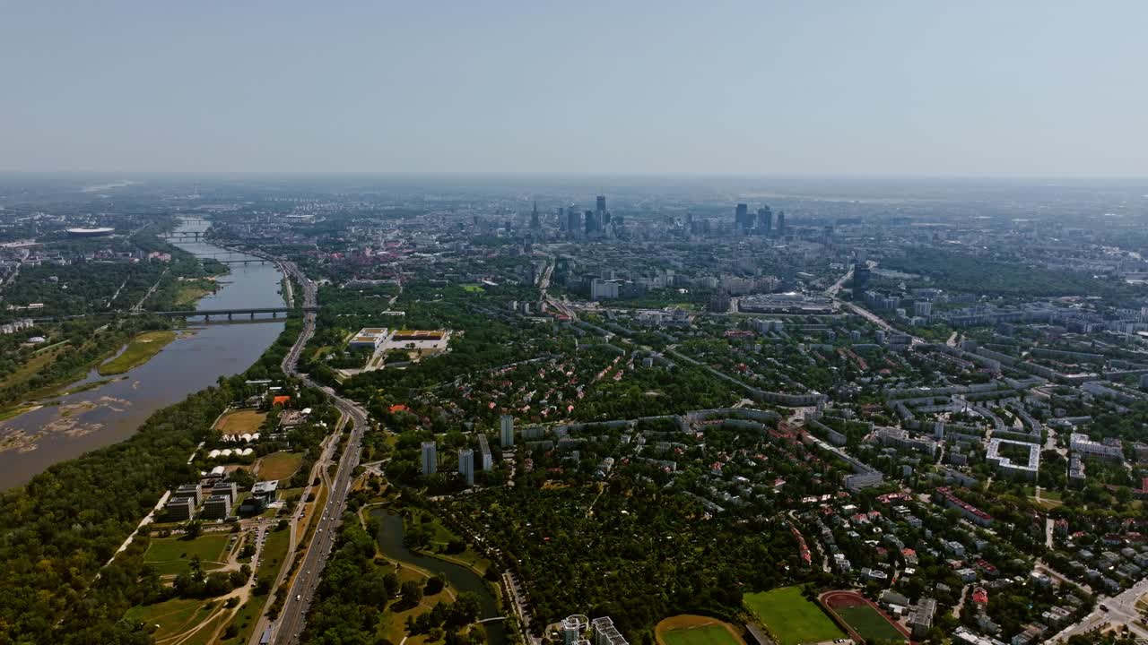 Static high altitude drone view, Warsaw’s vast city structure and flowing river