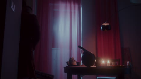 man getting dressed at night