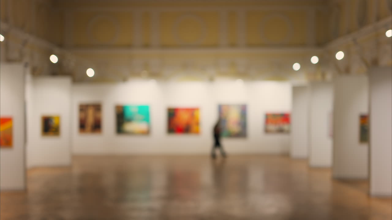 Blurred view of people walking through the National Museum of Fine Arts in Chisinau, Moldova