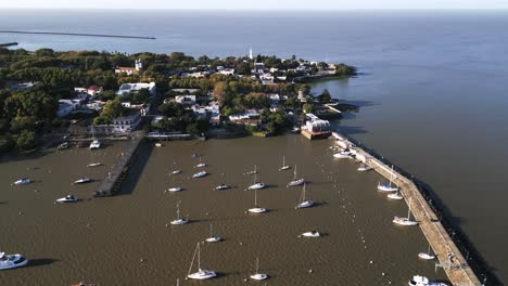 colonia del sacramento uruguay aerial drone with sailboat port and lighthouse