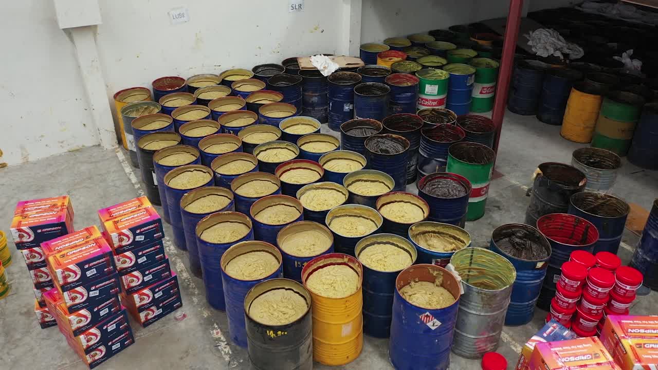 many full fill grease barrel in the warehouse, industry 5.0