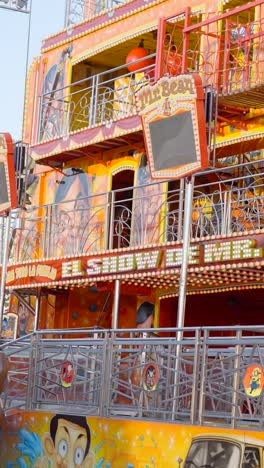 mr. bean themed multi-story carnival ride at an amusement park
