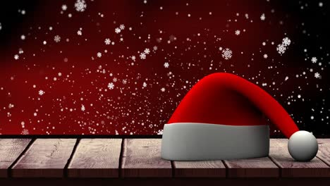 Animation-of-white-snowflakes-falling-over-christmas-hat-and-red-night-sky