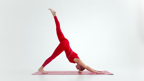 flexible young fit girl practice yoga or pilates perform wild thing pose for stretching and wellness. yoga postures - asanas. isolated silhouette on white background.