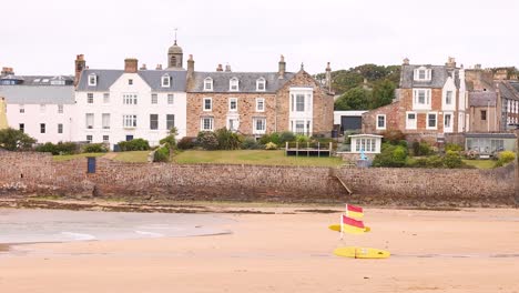 coastal view with buildings and beach flags