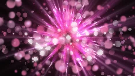 espinas rosadas giratorias y manchas de luz