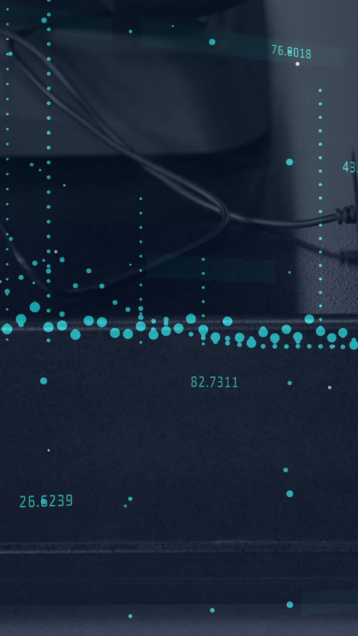 Statistical data processing against close up of hands using keyboard