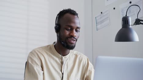 businessman using headset and laptop