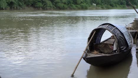 boats are moored at the river