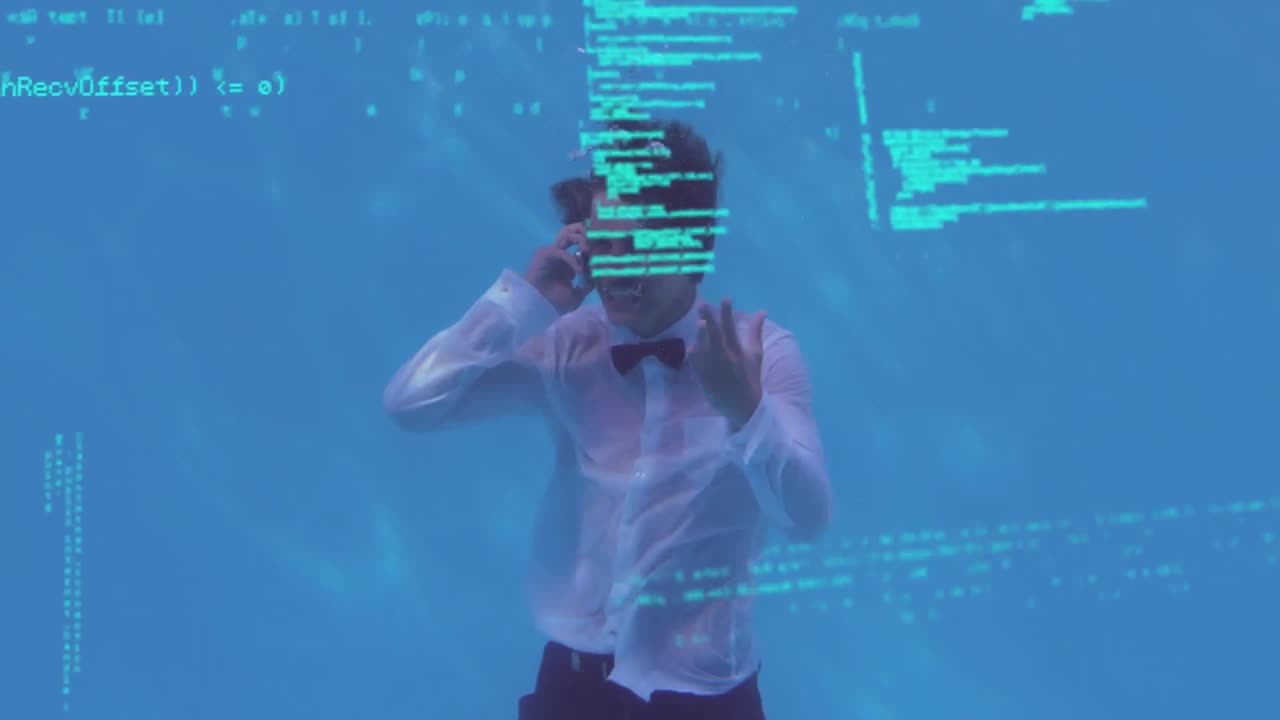 Man using a mobile phone under water