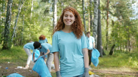 volunteers cleaning up a forest