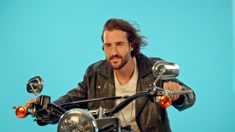 motorbike, driver and man in studio on blue