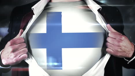 businessman opening shirt to reveal finland flag