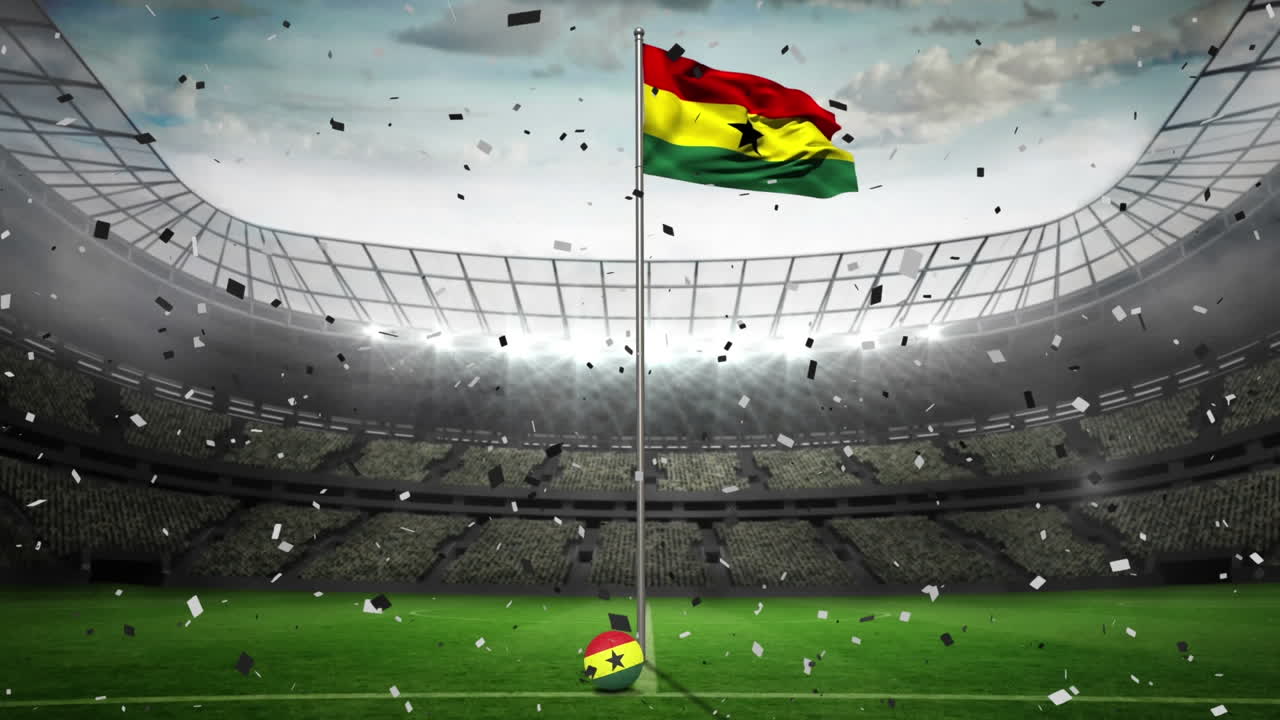 Coriandoli che cadono su una bandiera del Ghana sventolante sullo sfondo di uno stadio sportivo