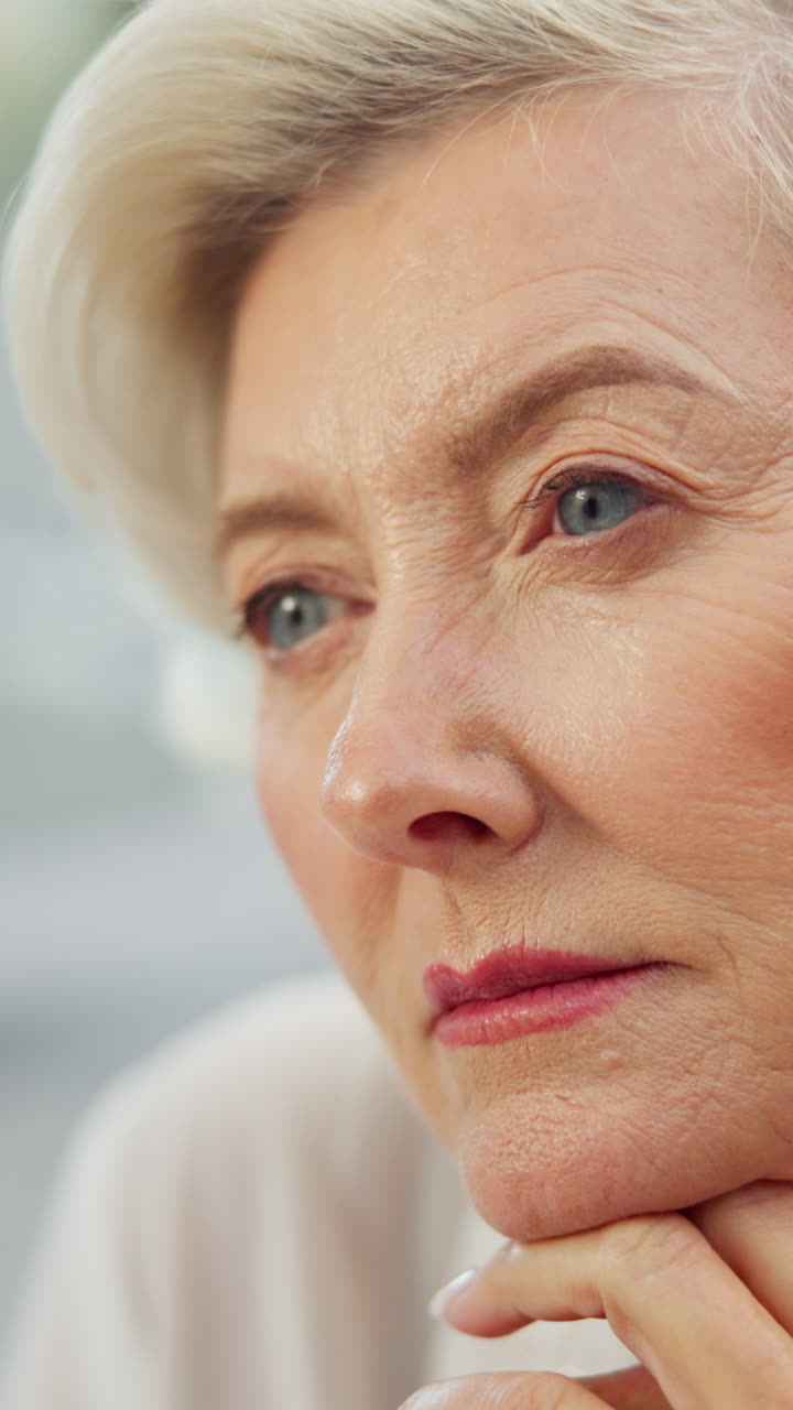 Close-up Portrait of a Pensive Senior Woman