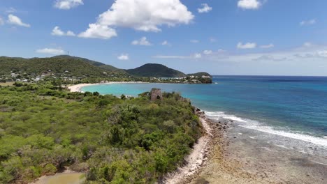 stunning aerial view of a tropical beach with ruins