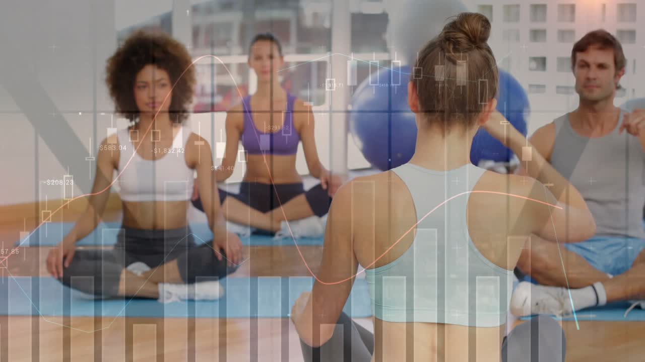 Instructor raising arm and guiding class into side stretch for fitness training, charts overlaying