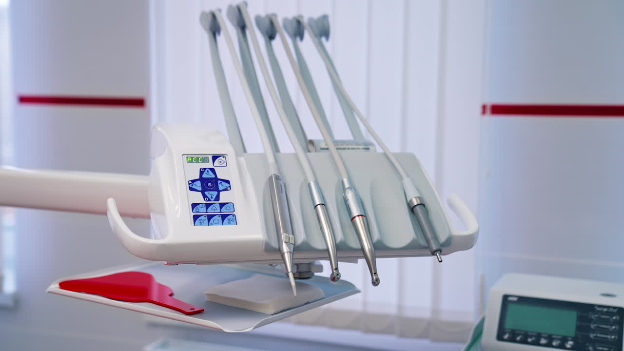 Set of tools for dental treatment at a dental clinic. Modern equipment in dentist cabinet. Toothcare, dental health.