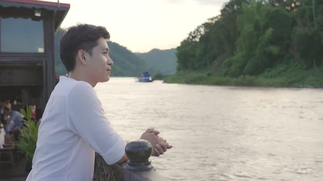 Asian Man Enjoy On Boat And View, Video In 4K