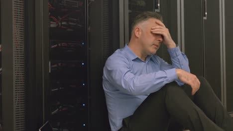 technician feeling the pressure in server room