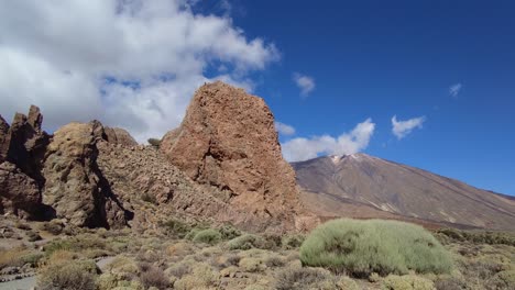 Aerial-view-of-Roques-de-García-with-Teide-volcano-in-the-background-on-Tenerife-the-Canary-Islands,-Spain