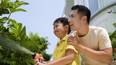 Asian-man-and-boy-in-the-backyard