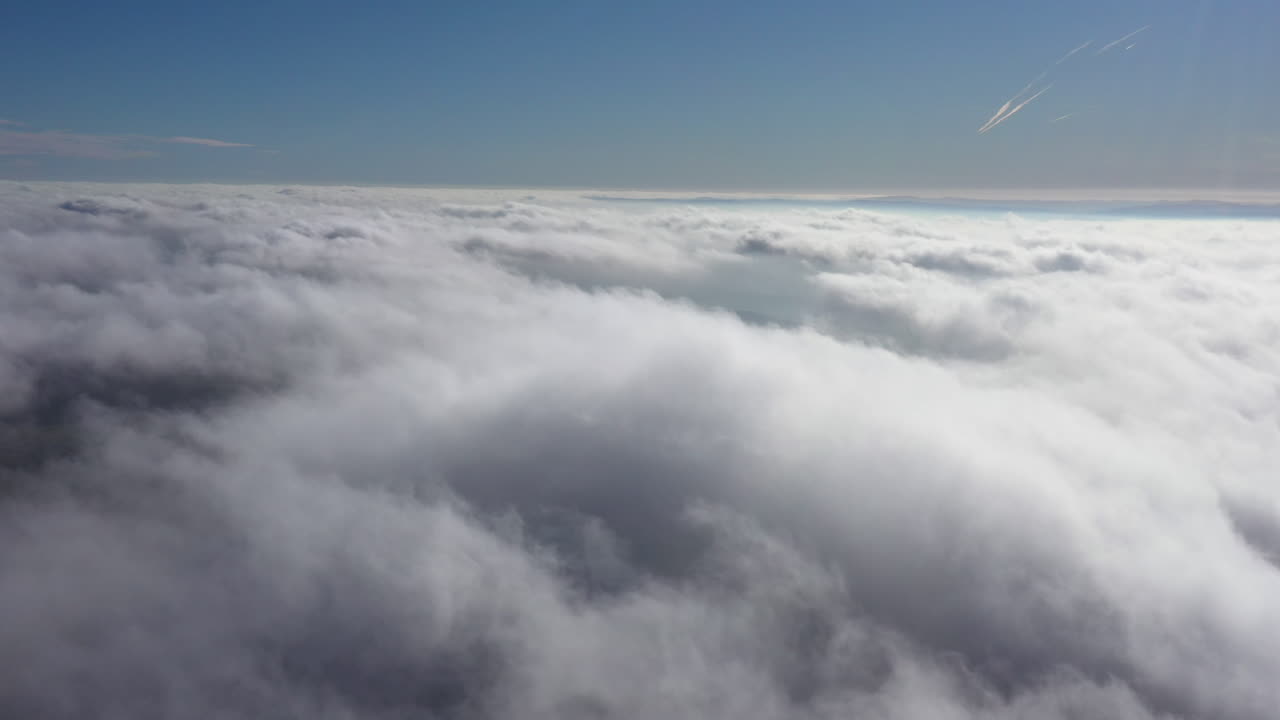 Above clouds fluffy aerial shot France sunny day