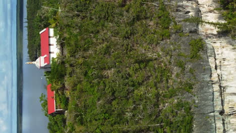 Aerial-view-of-a-hilltop-Chapel,-in-Lifou,-New-Caledonia---circling,-drone-shot